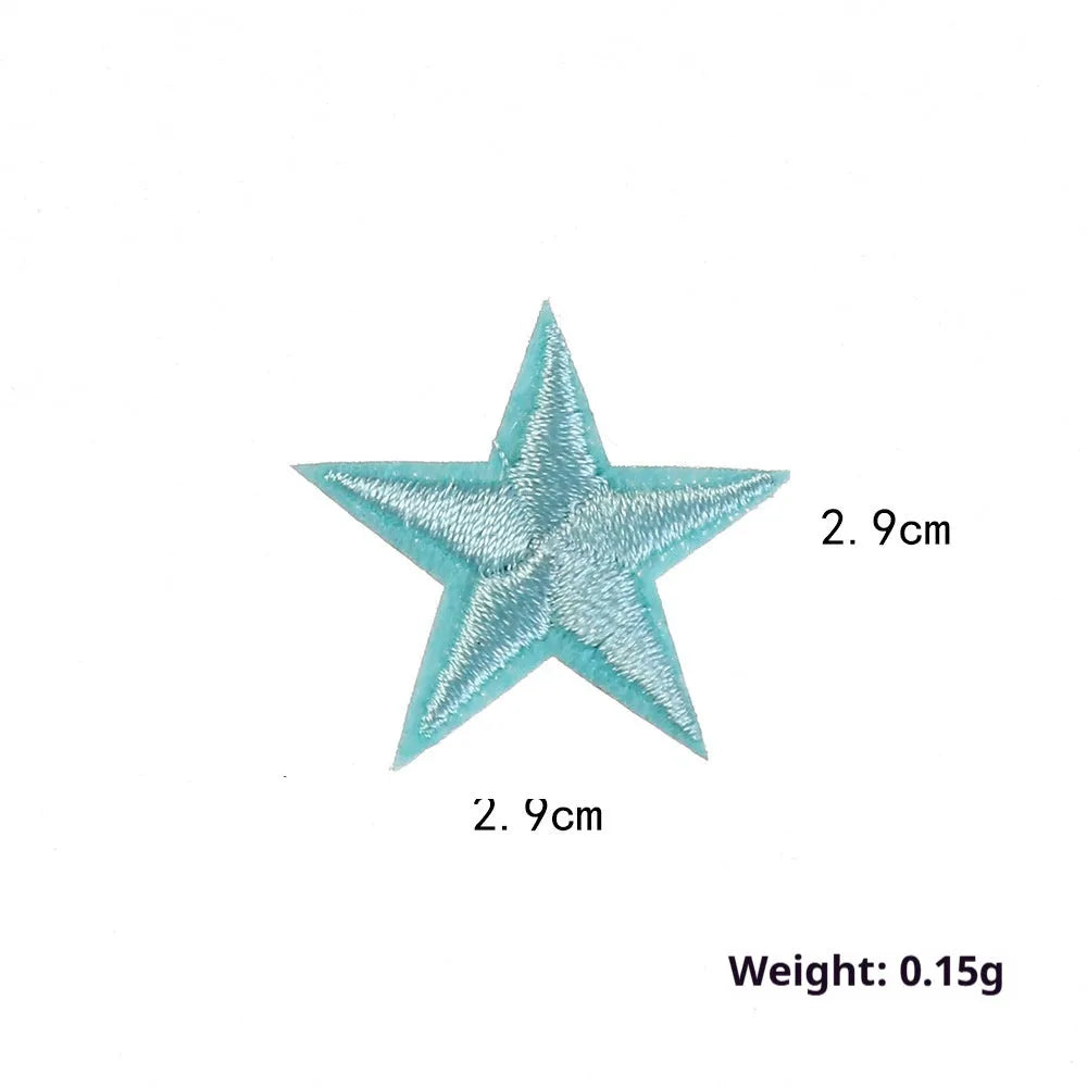Colourful five-pointed star cloth embroidery stickers for DIY clothing decoration on a fabric background.