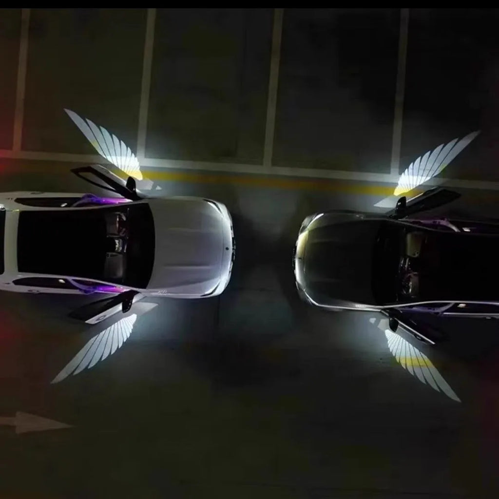 Car rearview mirror courtesy lamp with angel wings design showing white light projection