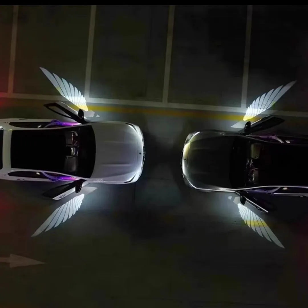 Car rearview mirror courtesy lamp with angel wings design showing white light projection