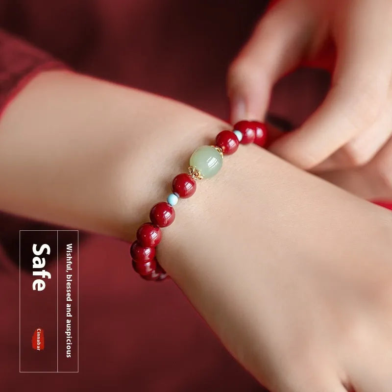 Purple gold sand cinnabar and Hetian jade bead bracelet in geometric ellipse shape.