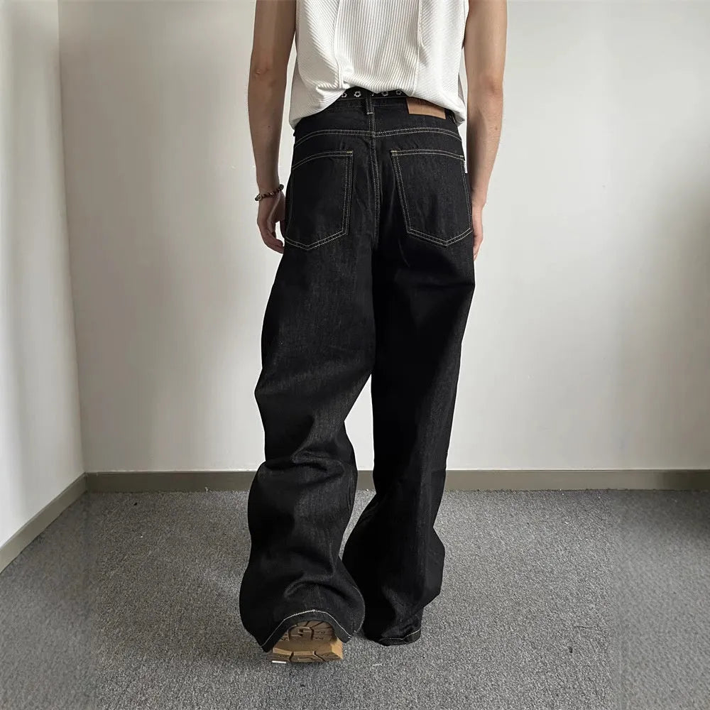 Black retro-style loose wide-leg jeans with straight-leg cut and zip placket closure