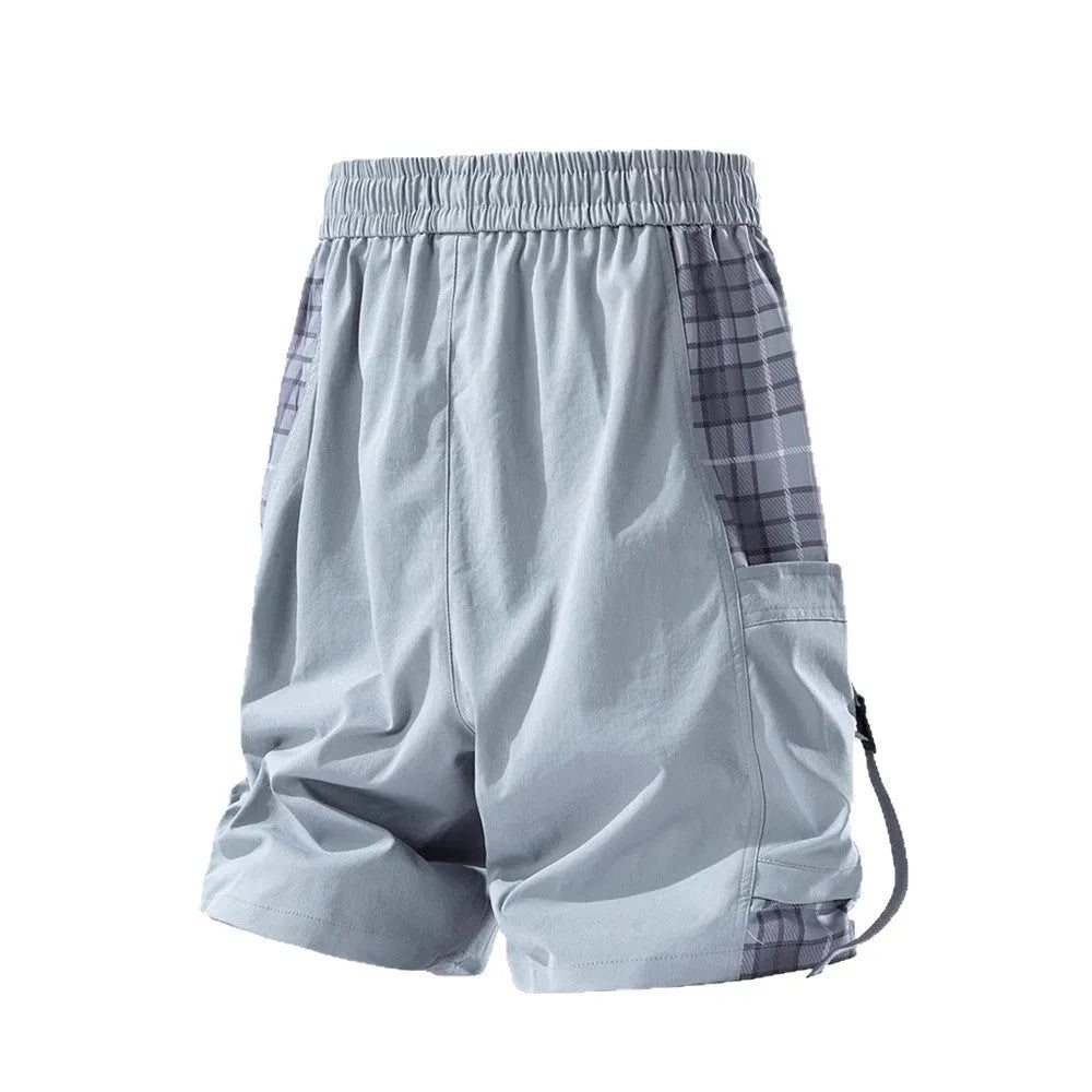 Men's casual cargo shorts with plaid stitching detail in loose fit design