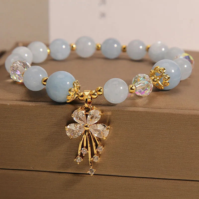 Amethyst crystal beaded bracelet with butterfly charms in mori normcore style