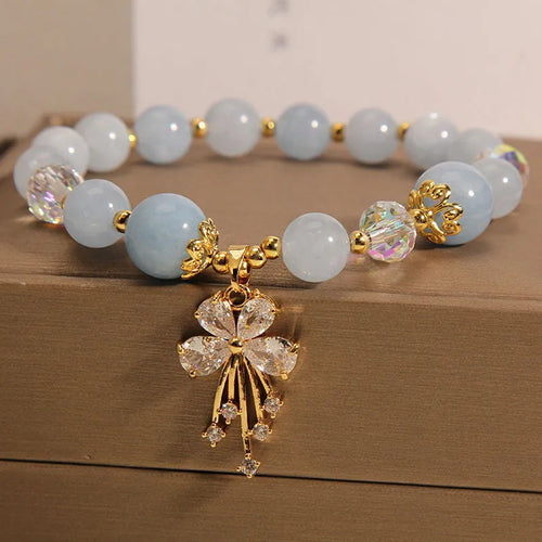 Amethyst crystal beaded bracelet with butterfly charms in mori normcore style