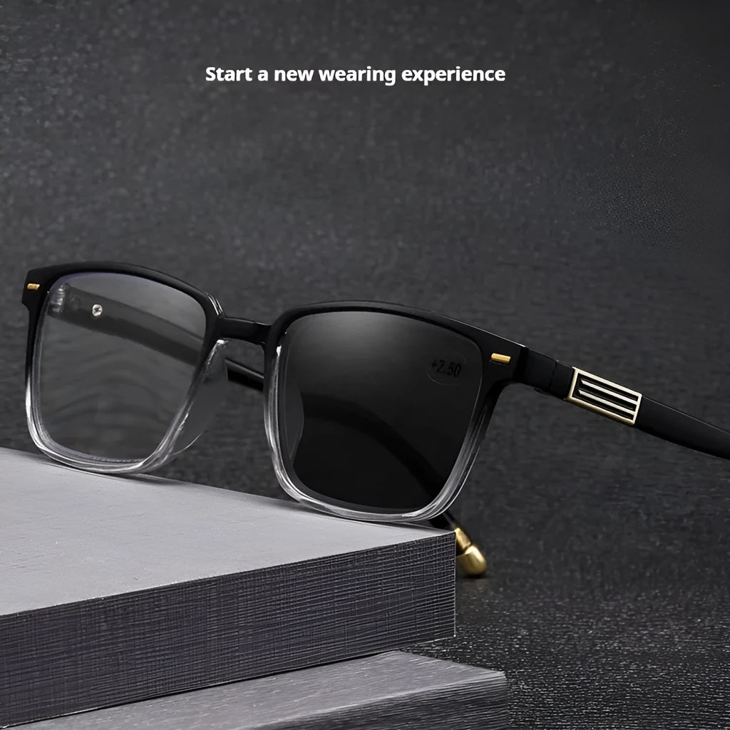 Multifocal anti-blue light reading glasses with colour-changing lenses in a black and silver frame style.