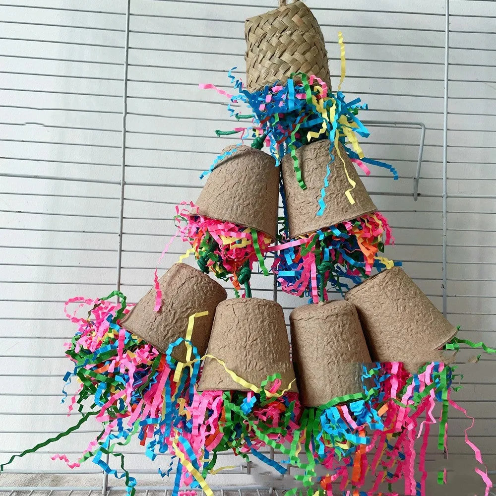 Parrot chewing toy made of woven palm with a paper cup, hanging at 38cm.