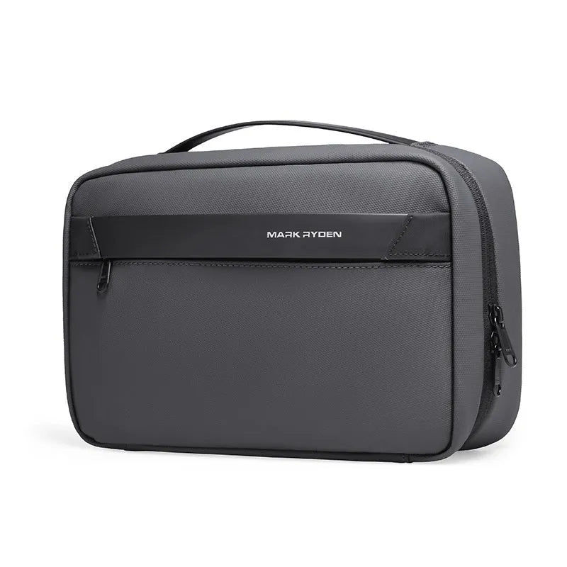 Black Oxford cloth toiletries bag with multiple compartments open, showing wet-dry separation design.