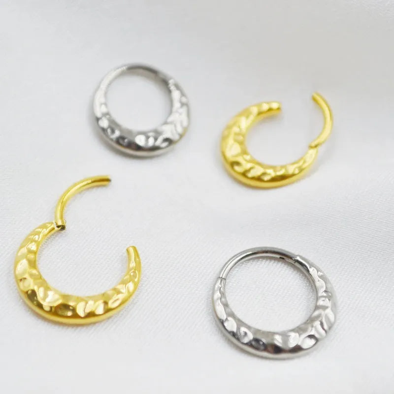 Titanium alloy ASTM F136 concave-convex carved nose ring in gold or silver colour.