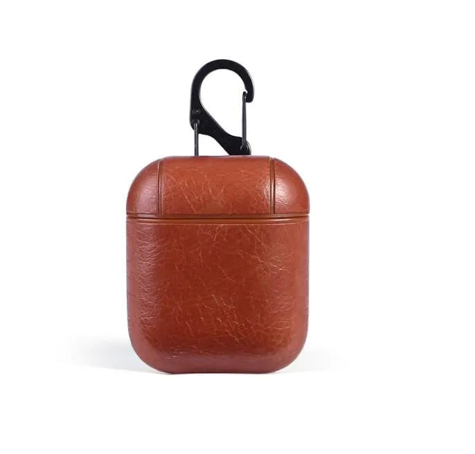 Leather protective case for Apple Airpods charging case in black, brown, light brown, and red colours