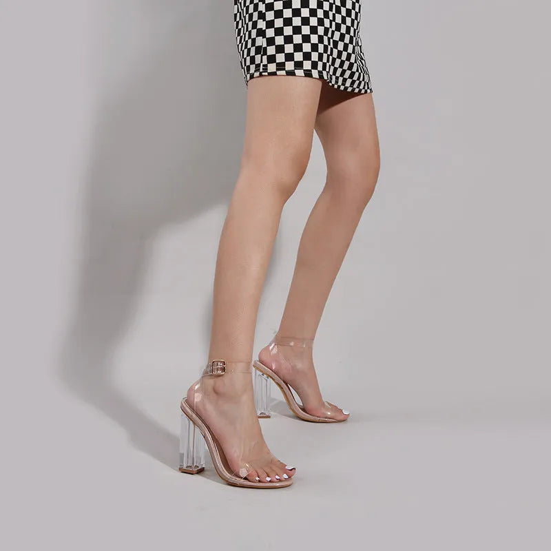 Apricot-coloured women's high heel sandals with glass heels and an ankle buckle.