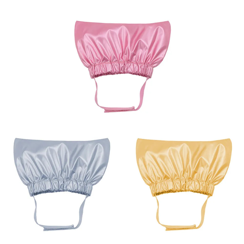 Adjustable waterproof shower cap for dogs and cats in silver, pink, or gold.