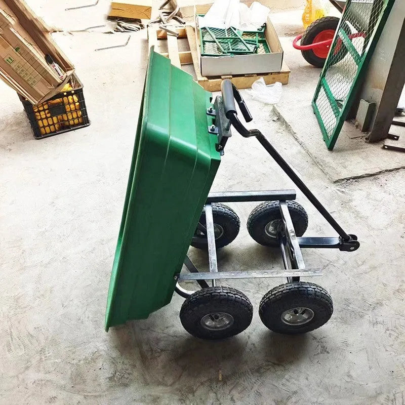 Green four-wheel plastic dump truck with a steel frame and tipping bed for garden and farm use.