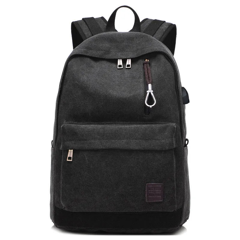Canvas backpack with external USB charging port showing coffee colour option with multiple compartments.