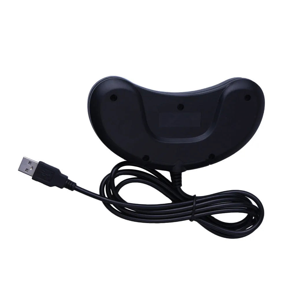 Black Sega-style USB wired PC game controller with 1.8-metre cable on a desk.