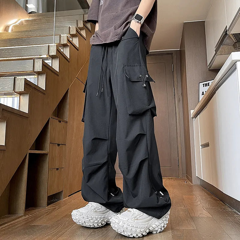Women's plus size waterproof trousers in straight-leg design with drawstring waist