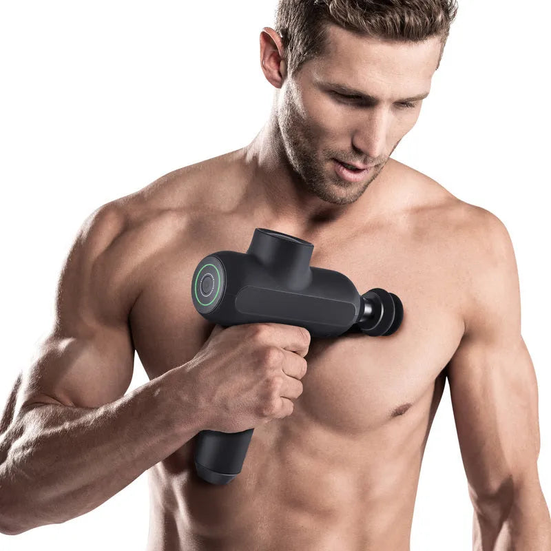 Black handheld electric muscle massager with multiple attachment heads on a white background