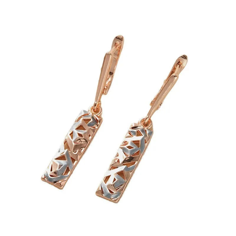 A pair of rectangular two-tone hollow stud earrings with an electroplated picture-style finish.