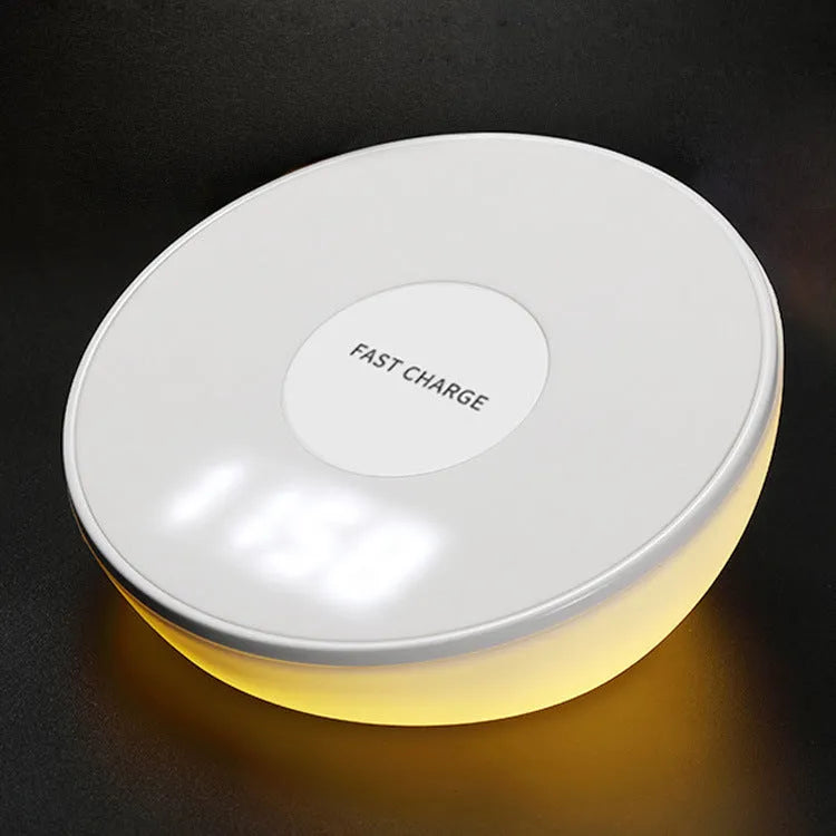 White 10W wireless phone charger with digital clock display and control buttons.