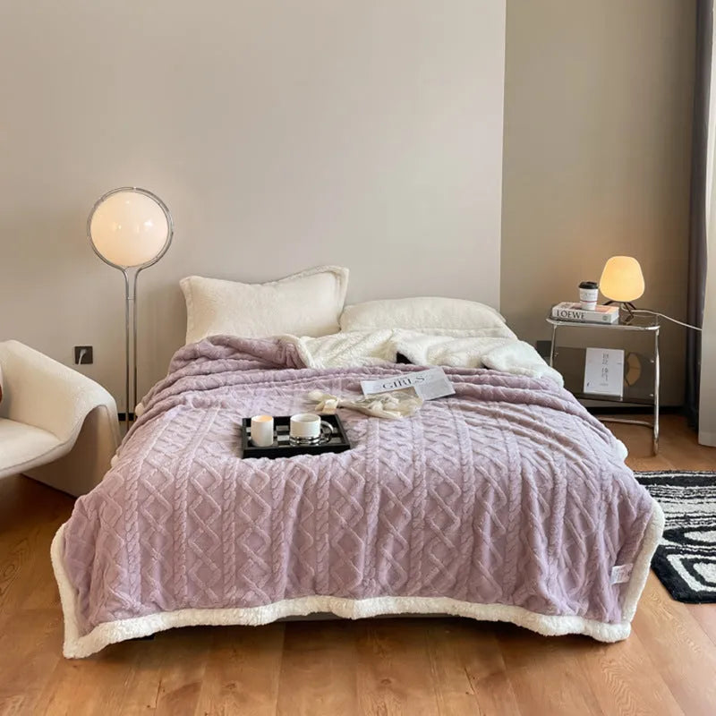 Polyester winter thermal flannel blanket in beige, laid flat showing its texture and simple modern style.