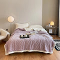Polyester winter thermal flannel blanket in beige, laid flat showing its texture and simple modern style.