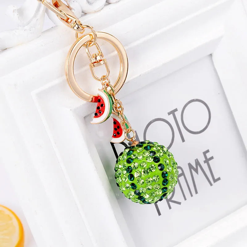 Green watermelon slice zinc alloy keychain measuring 12cm with keyring loop.