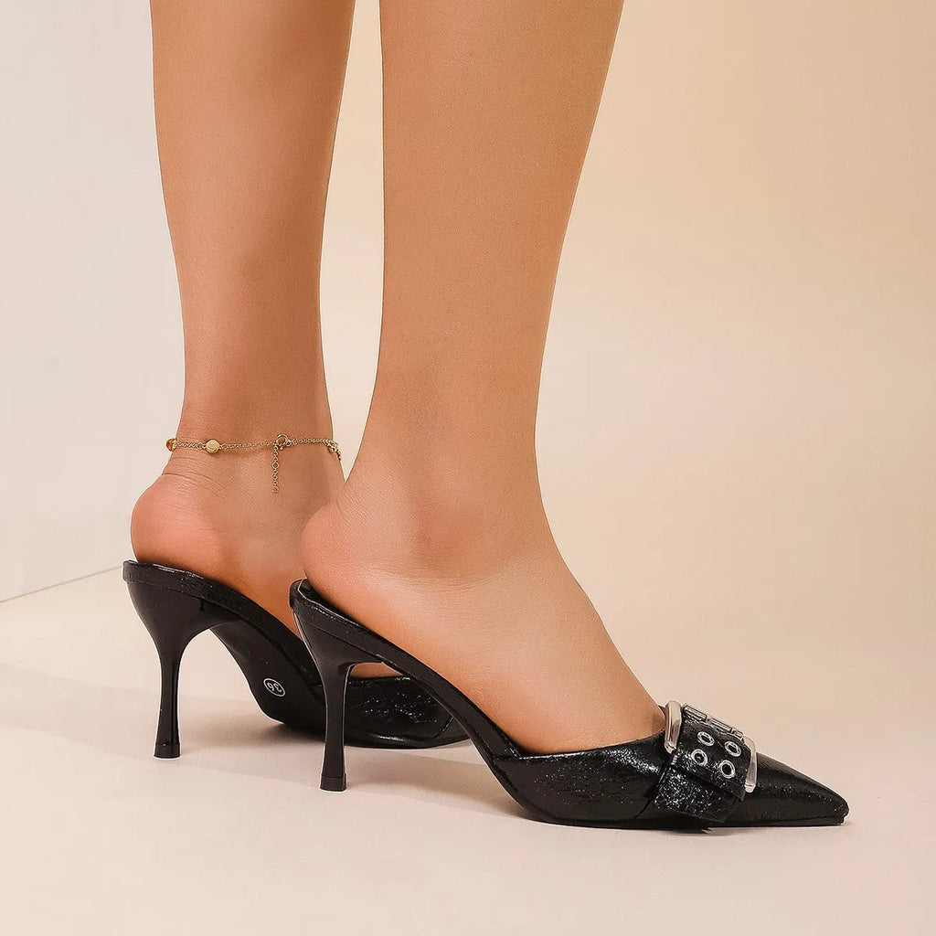 Black women's high heels with pointed toe and decorative buckle ankle strap