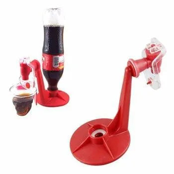 Red plastic Magic Tap soda dispenser attached to an inverted 2-litre bottle