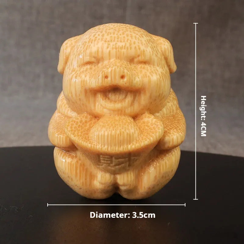 Solid bamboo carving ornament with cute pig design measuring 4cm tall