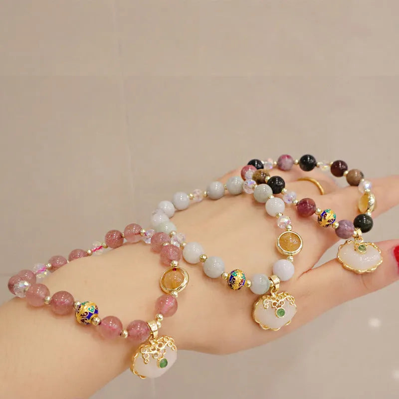 Women's geometric bracelet with strawberry quartz or gray jade stones and ethnic metal decorations
