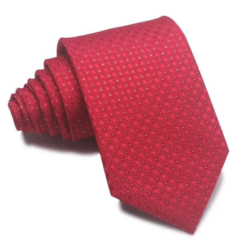 A man's striped formal tie in an arrow style, showing the jacquard texture and width of 7-8 cm.