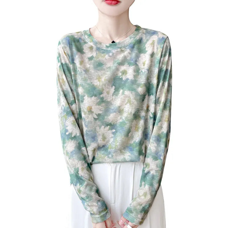 A women's round neck pullover in a Tencel cotton knitted fabric, shown in a printed colourway with regular sleeves.