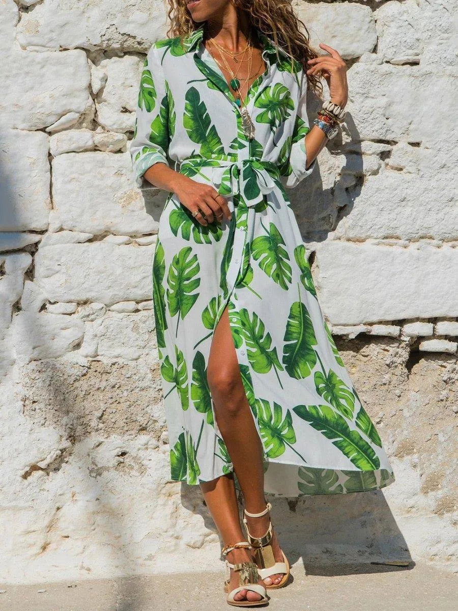 Women's printed chiffon V-neck dress with high waist and A-line skirt on a hanger.