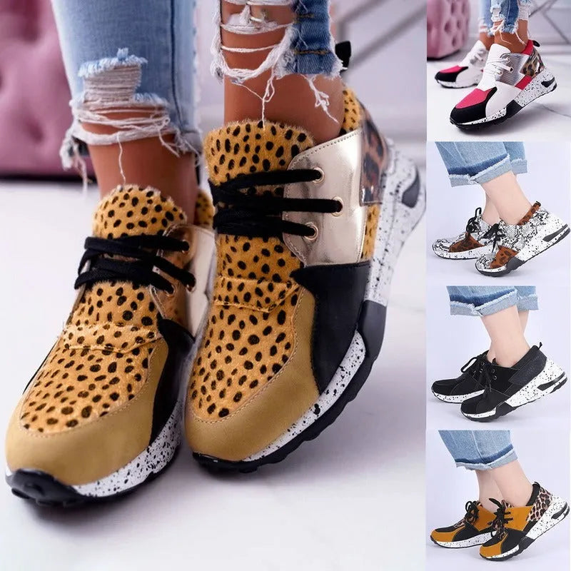 Women's casual suede wedge sneakers in leopard print with a low-cut design and plastic sole.