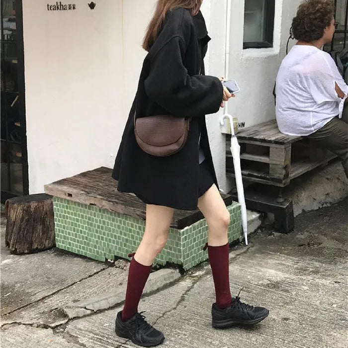 Women's Korean-style loose overcoat in solid colour with long sleeves, available in khaki or black
