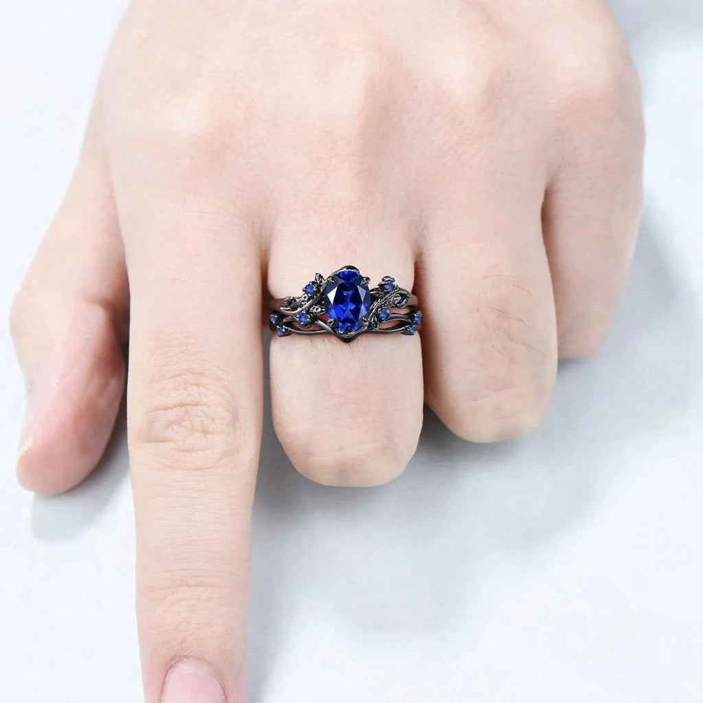 Women's gun black geometric ring with navy blue rhinestone decoration on copper base