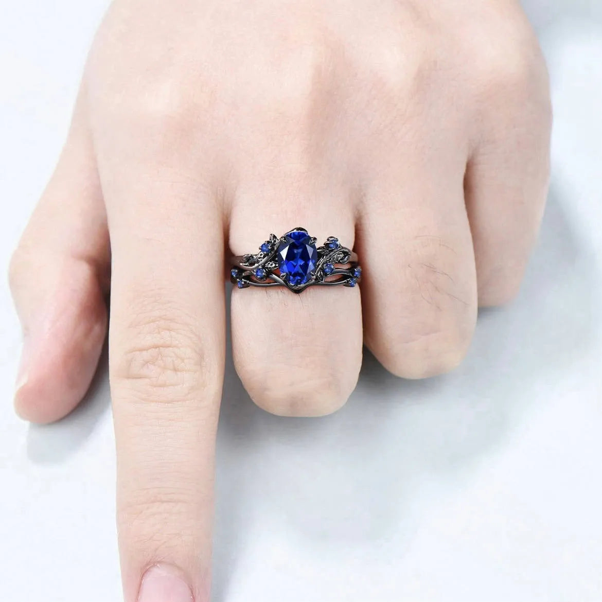 Women's gun black geometric ring with navy blue rhinestone decoration on copper base