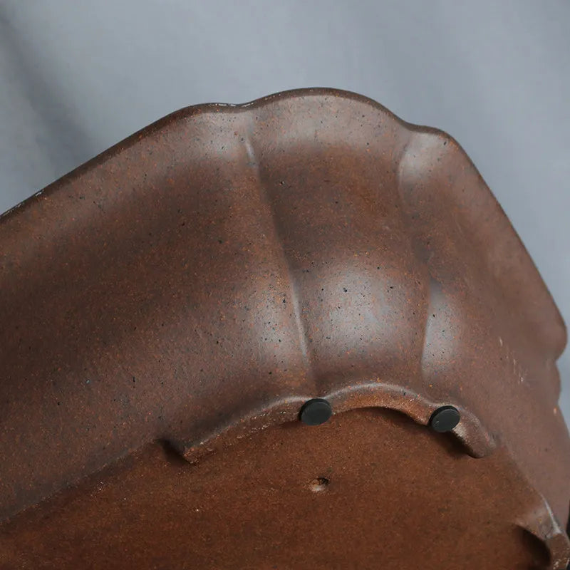 A rectangular purple sand clay bonsai pot on a floor, showing its modern simple design.