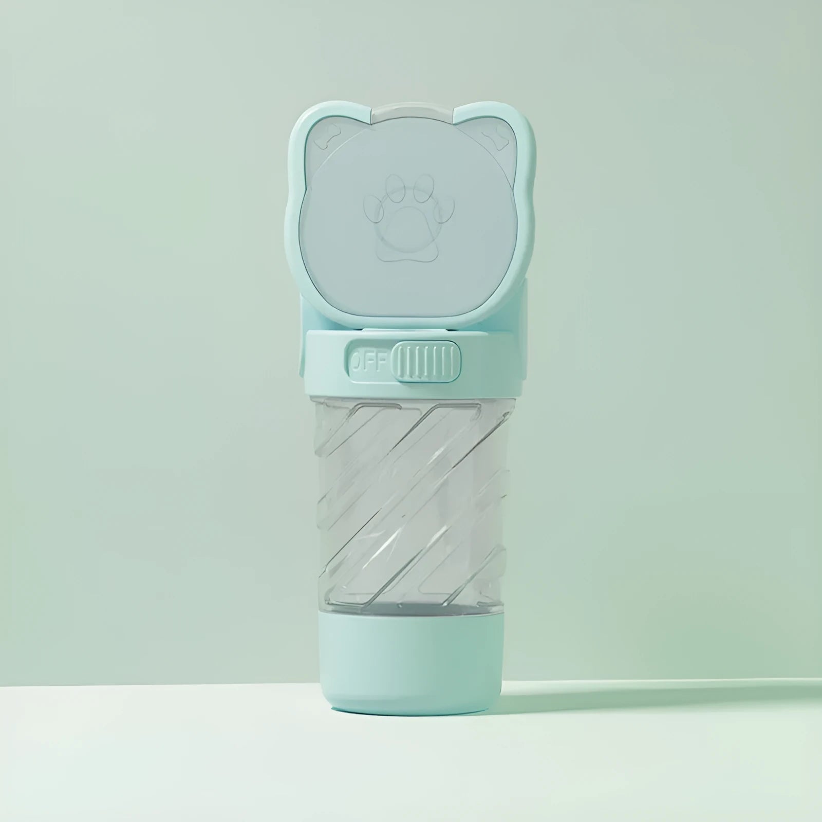 Green, pink, or white 3-in-1 portable pet water bottle with food container and garbage bag dispenser attached to a strap.