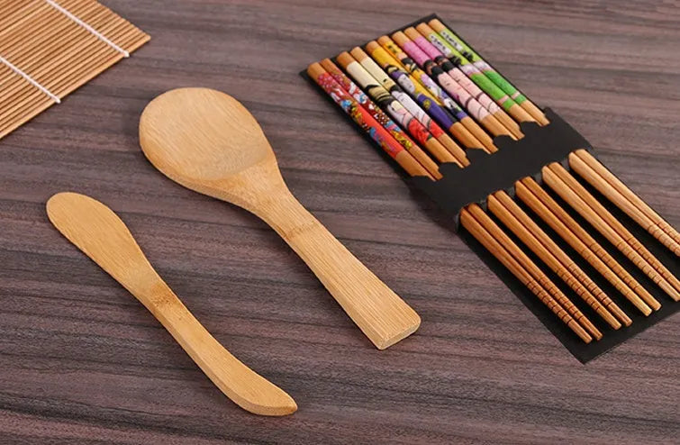 White sushi tool set with bamboo rolling mat and rice paddle for home sushi making