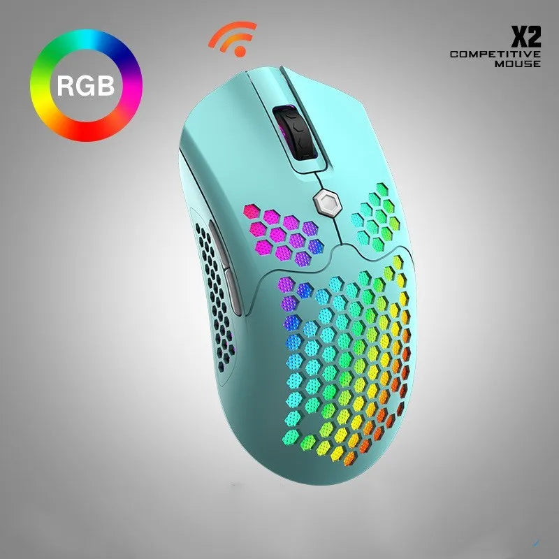 Free Wolf X2 wireless RGB gaming mouse in black on a mouse pad, showing ambidextrous shape and side buttons.