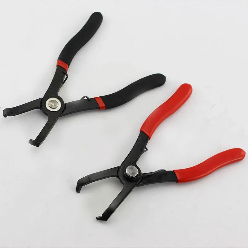 Red round nail removal pliers with PVC handles and adjustable jaws for interior trim work