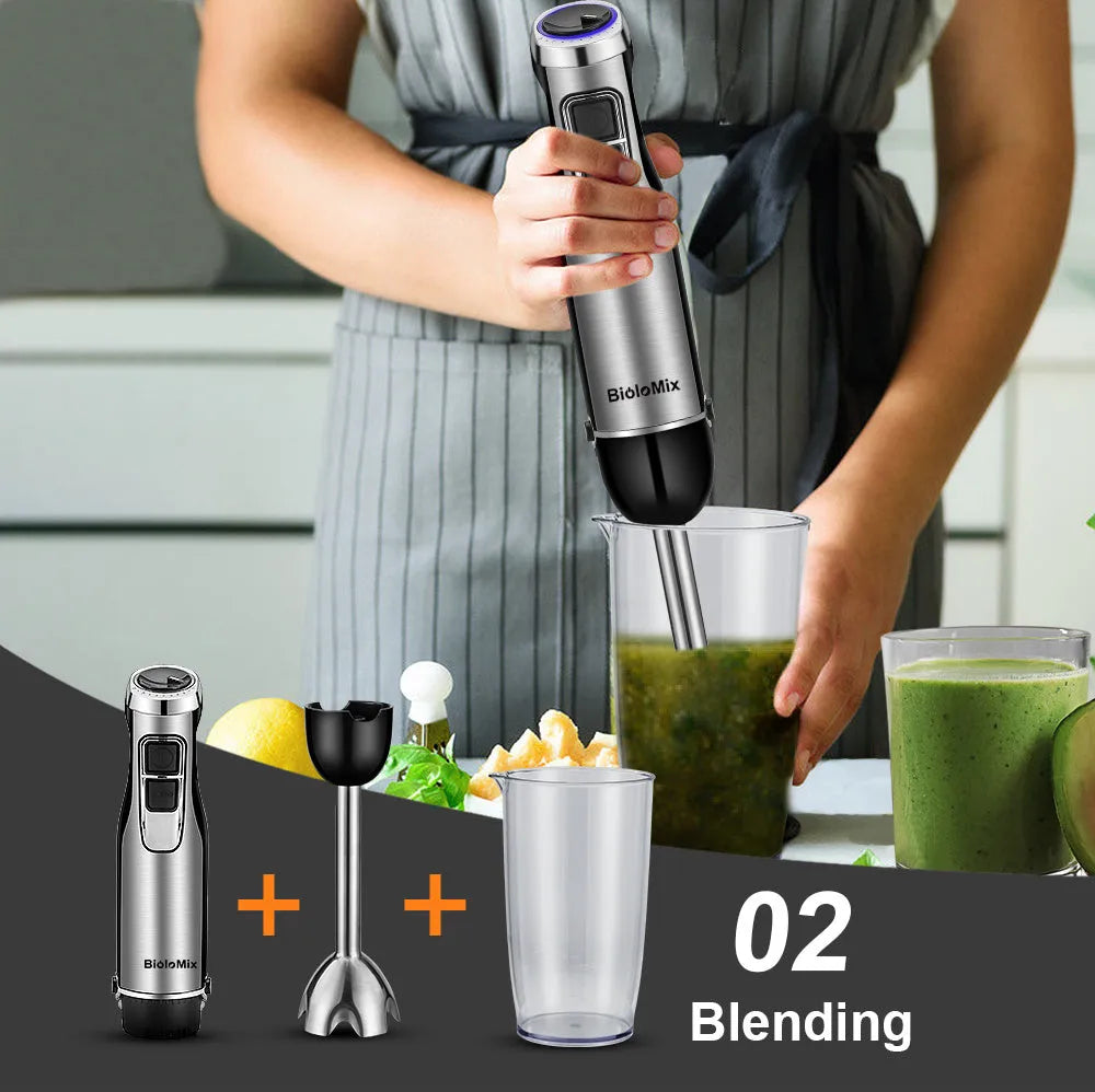 Silver Biolomix hand blender kit with motor unit, stainless steel shaft, whisk, chopper bowl, and blending beaker.