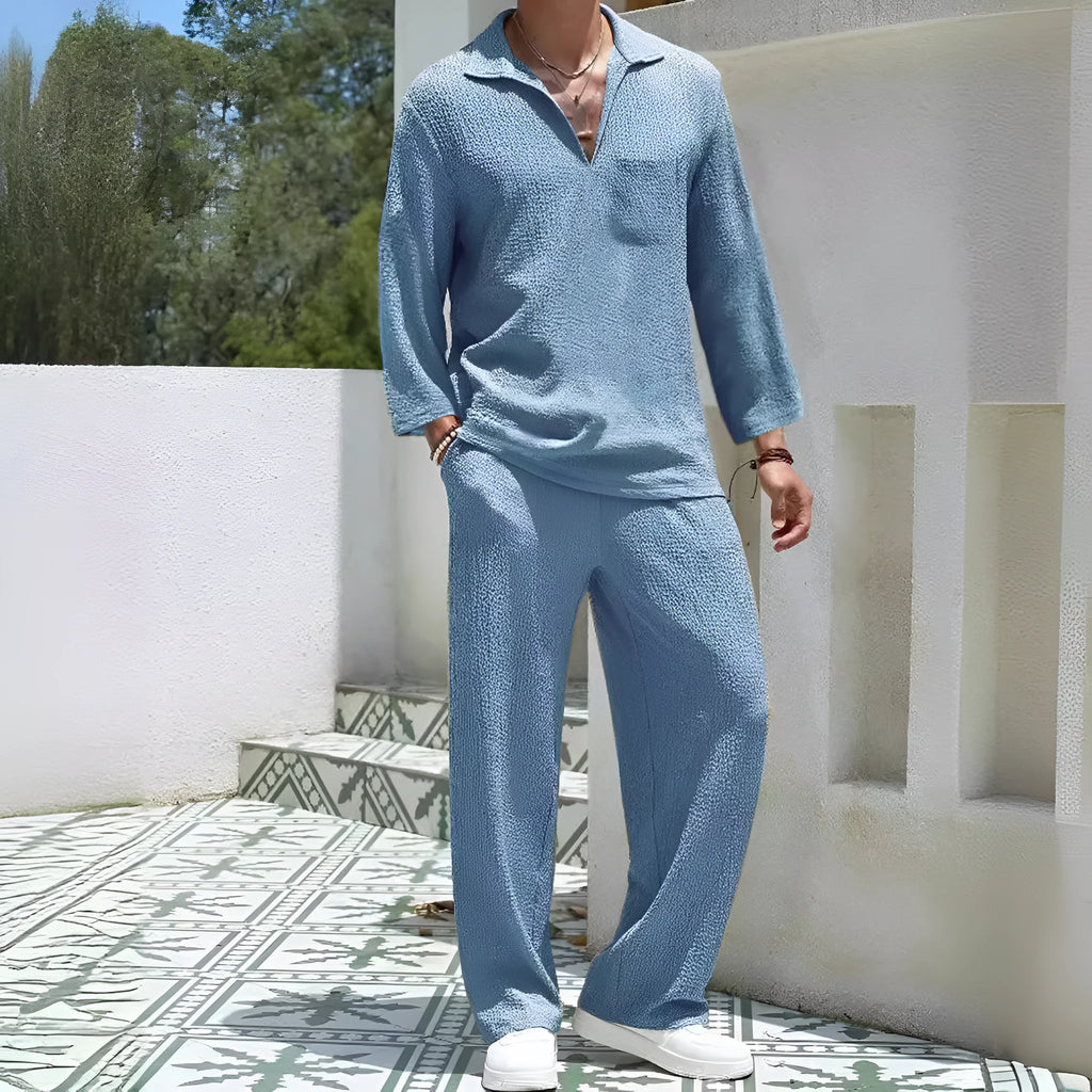 Men's casual shirt trousers suit in polyester, shown in lake blue, with shirt-style jacket and matching trousers.