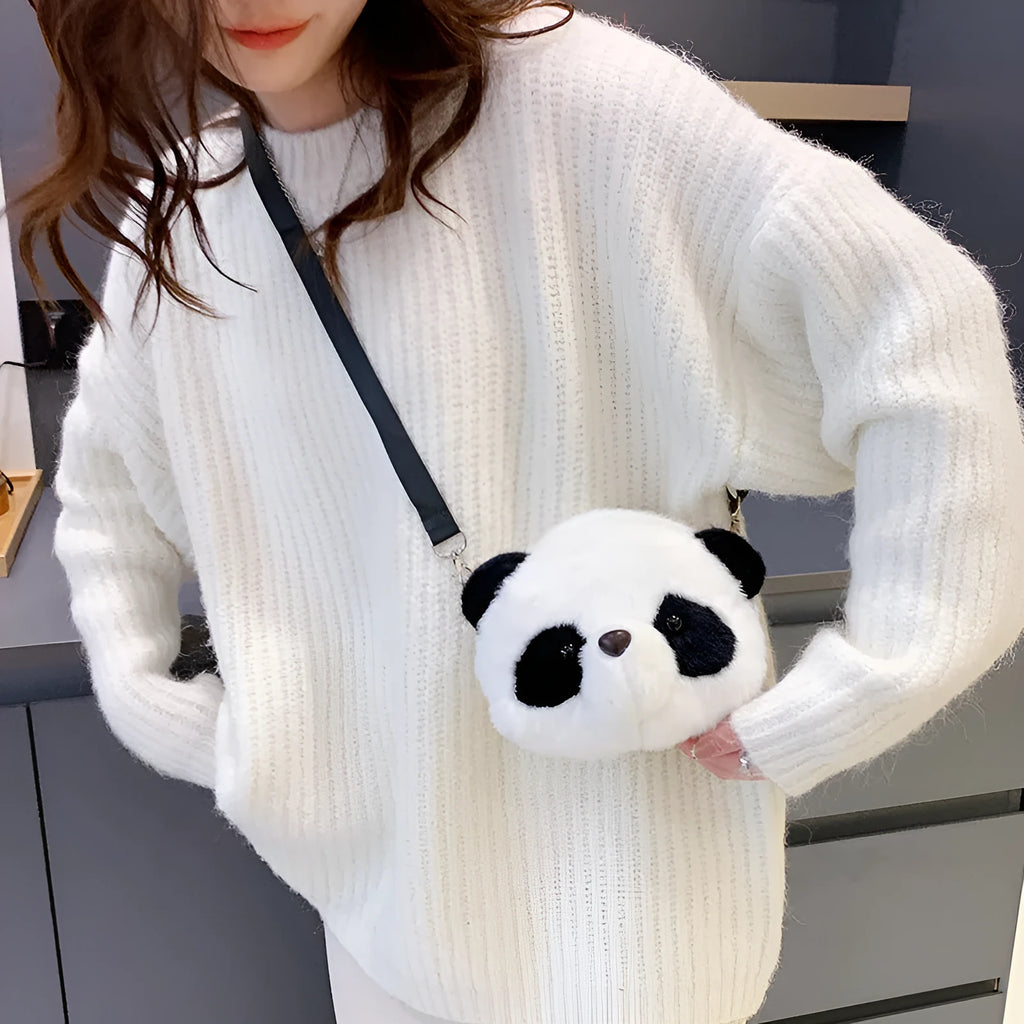 Soft plush cylindrical crossbody bag in Panda Head colour, showing dimensions and sandwich pocket.