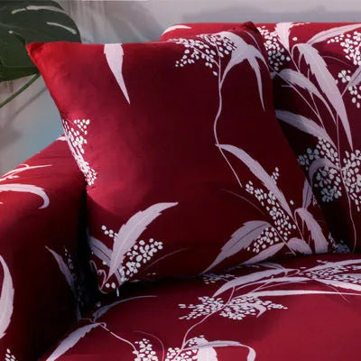 Geometric patterned stretch sofa slipcover fitted on a three-seater sofa