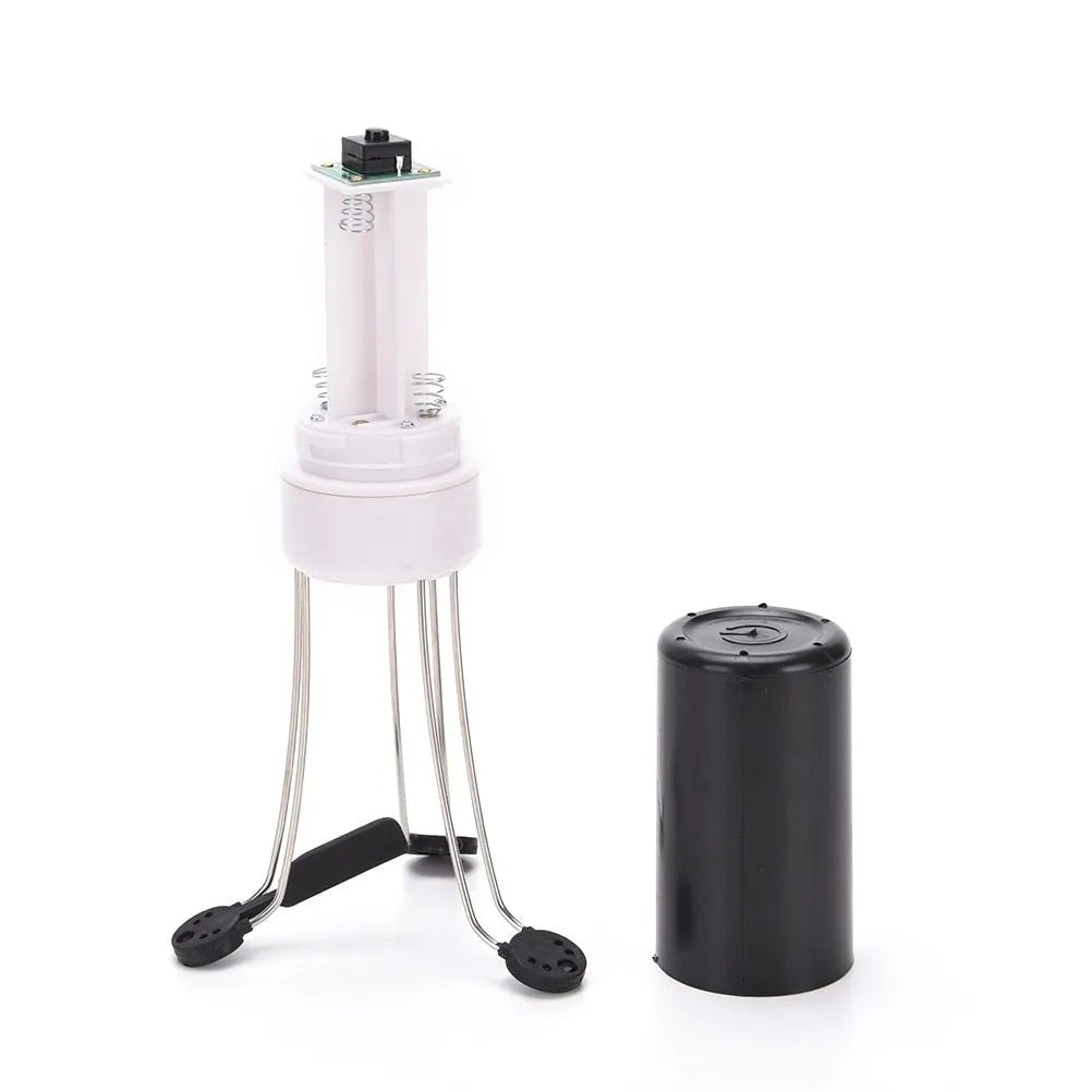 White and black automatic kitchen food stirrer with stainless steel whisk on countertop.