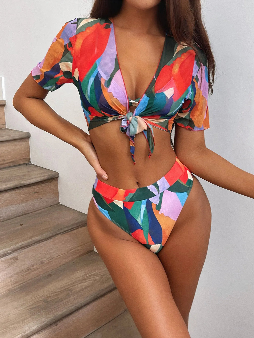 Red women's printed split swimsuit with triangle bikini briefs