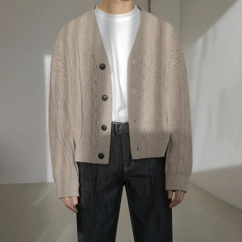 Coffee brown loose fit acrylic cardigan with long sleeves on a plain background