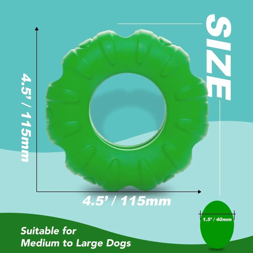 Blue natural rubber tyre-shaped dog chew toy with oval openings, for slow feeding and interactive play.