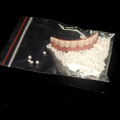 Silicone simulation dentures showing upper and lower teeth set for dental training